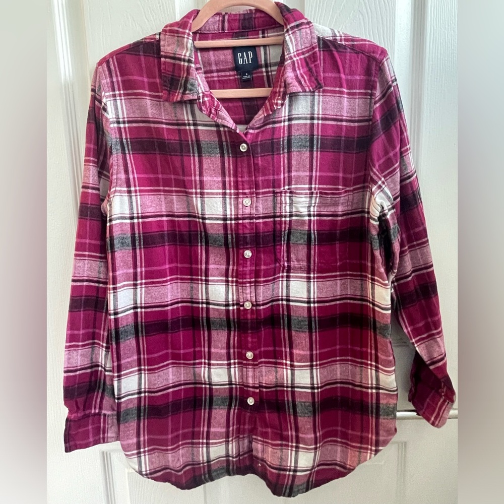 Plead pink button down shirt.